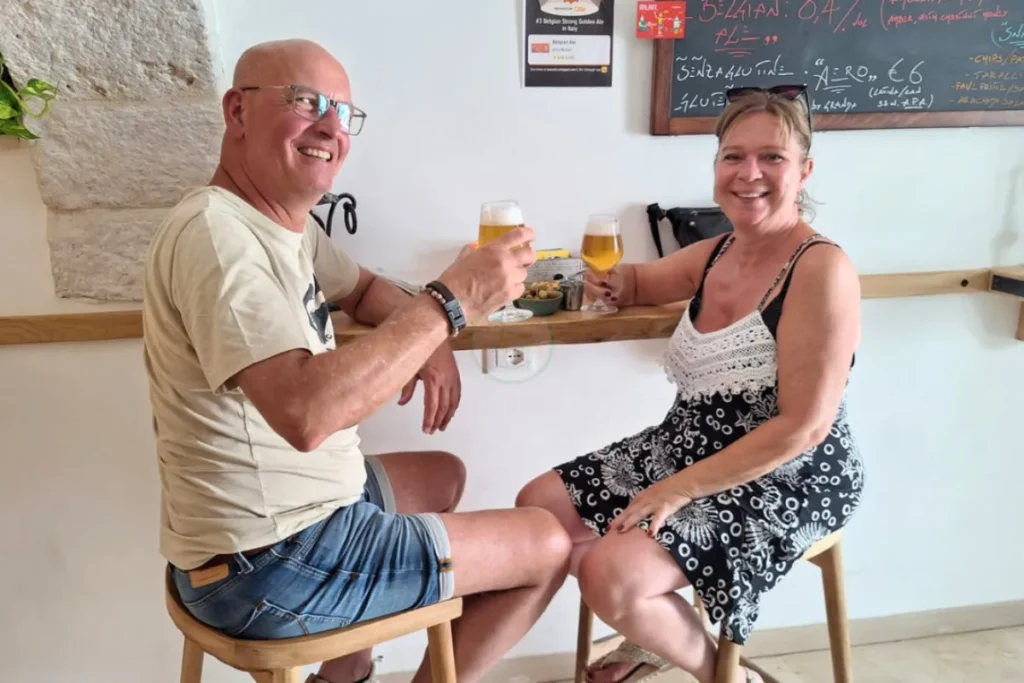 Participants enjoying cold craft beer after completing the e-bike tour 🍻