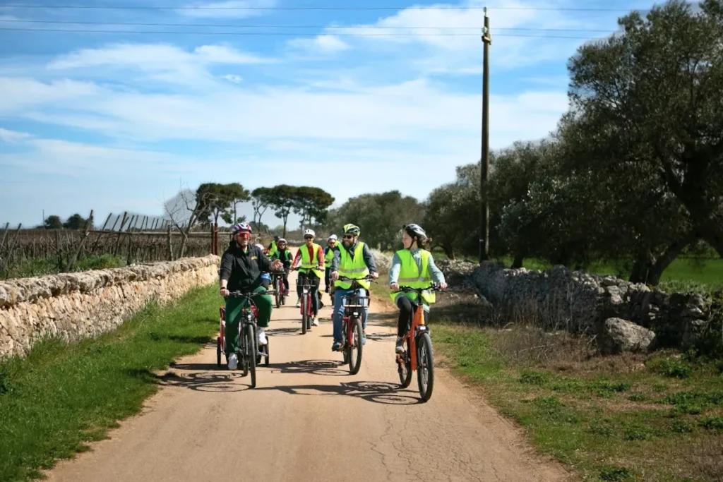 Team building e-bike experience in central Puglia with a corporate group riding through rural landscapes