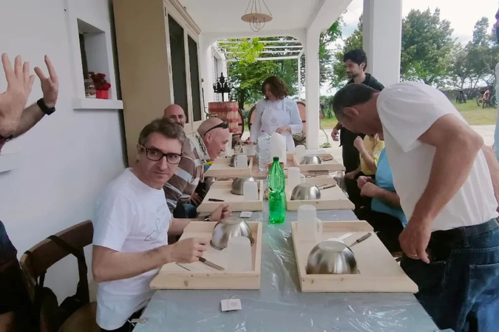 Group riding e-bikes on rural roads in central Puglia